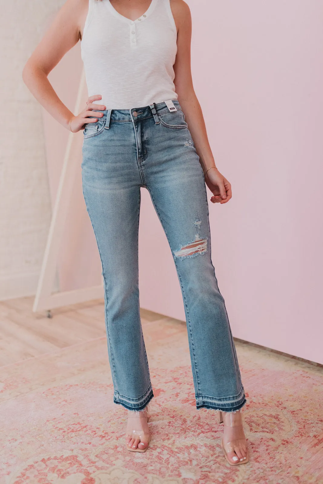 Judy Blue Mid Rise Bootcut Distressed Hem Jeans